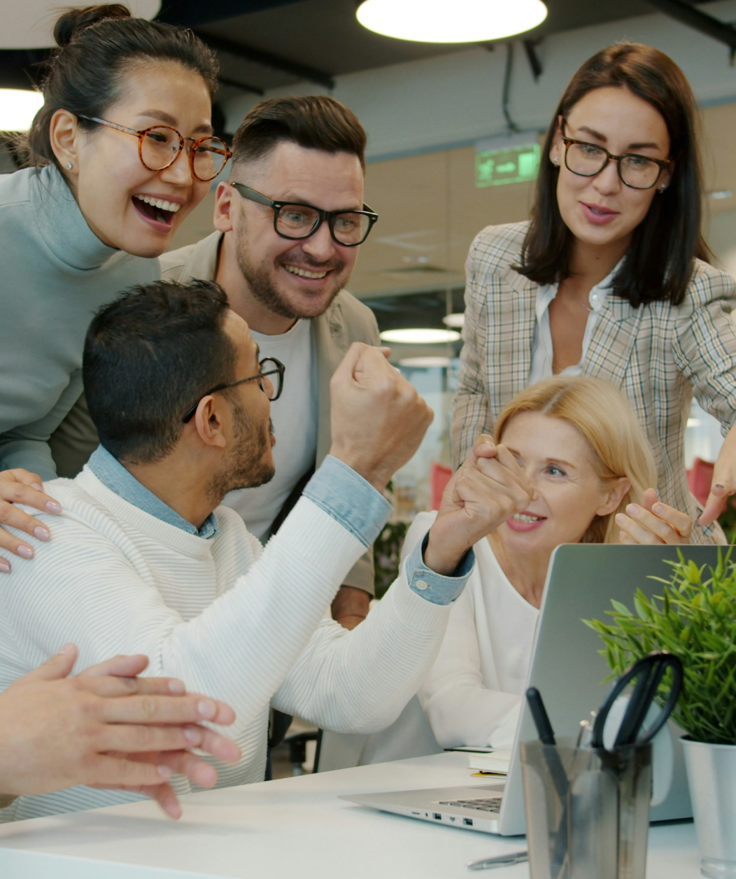 Business team celebrating success with high-five gesture demonstrating improved lead conversion results